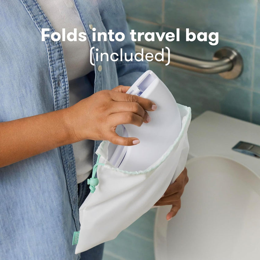 Frida Baby Fold - and - Go Portable Potty Seat for Toilet, Foldable Travel Potty Seat for Toddler, Fits Round & Oval Toilets, Non - Slip Base, Handles, Includes Free Travel Bag - 7DAY'S