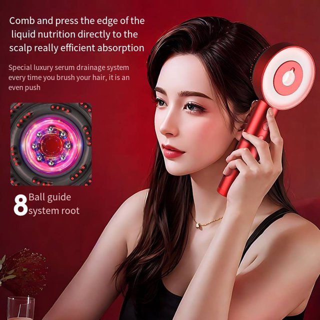 Red scalp massager with 8-ball guide system for serum absorption, used on woman’s hair