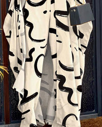 CHICME Women's 2 Piece Outfits 2025 Abstract Print Batwing Sleeve V Neck Top with High Slit and Loose Wide Leg Pants Set