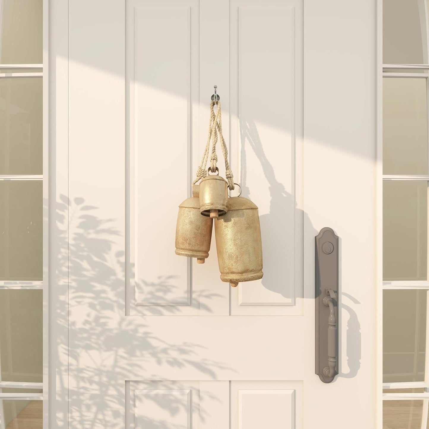 Deco 79 Gold Metal Tibetan Inspired Decorative Giant XL Cow Bells with Jute Hanging Rope, Set of 3 10",8",6"H - Cylindrical