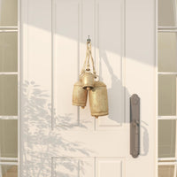 Deco 79 Gold Metal Tibetan Inspired Decorative Giant XL Cow Bells with Jute Hanging Rope, Set of 3 10",8",6"H - Cylindrical