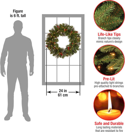 National Tree Company 24 in Pre-Lit Crestwood Spruce Artificial Christmas Wreath, Christmas Decoration with Glitter, Pinecones, Red Berries, 50 Clear LED Lights, 160 Tips, Timer, Green