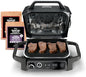 Ninja OG751 Woodfire Pro Outdoor Grill Built-In Thermometer,7-in-1 Master Grill,BBQ Smoker,& Outdoor Air Fryer Plus Bake,Roast,Dehydrate & Broil,Woodfire Technology,Weather-Resistant,Grey XL