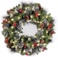 National Tree Company 24 in Pre-Lit Crestwood Spruce Artificial Christmas Wreath, Christmas Decoration with Glitter, Pinecones, Red Berries, 50 Clear LED Lights, 160 Tips, Timer, Green