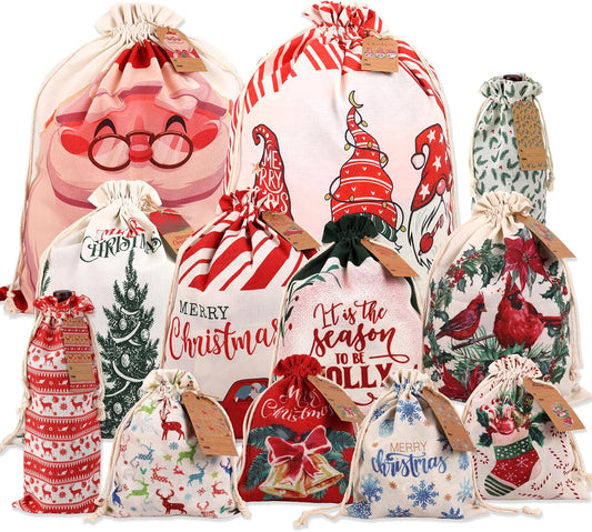 POPGIFTU 12 Pack Christmas Canvas Drawstring Gift Bags — Reusable Fabric Santa Sacks in Mixed Sizes with Kraft Tags for Holiday Present Packaging, Xmas Decorations & Party Favors