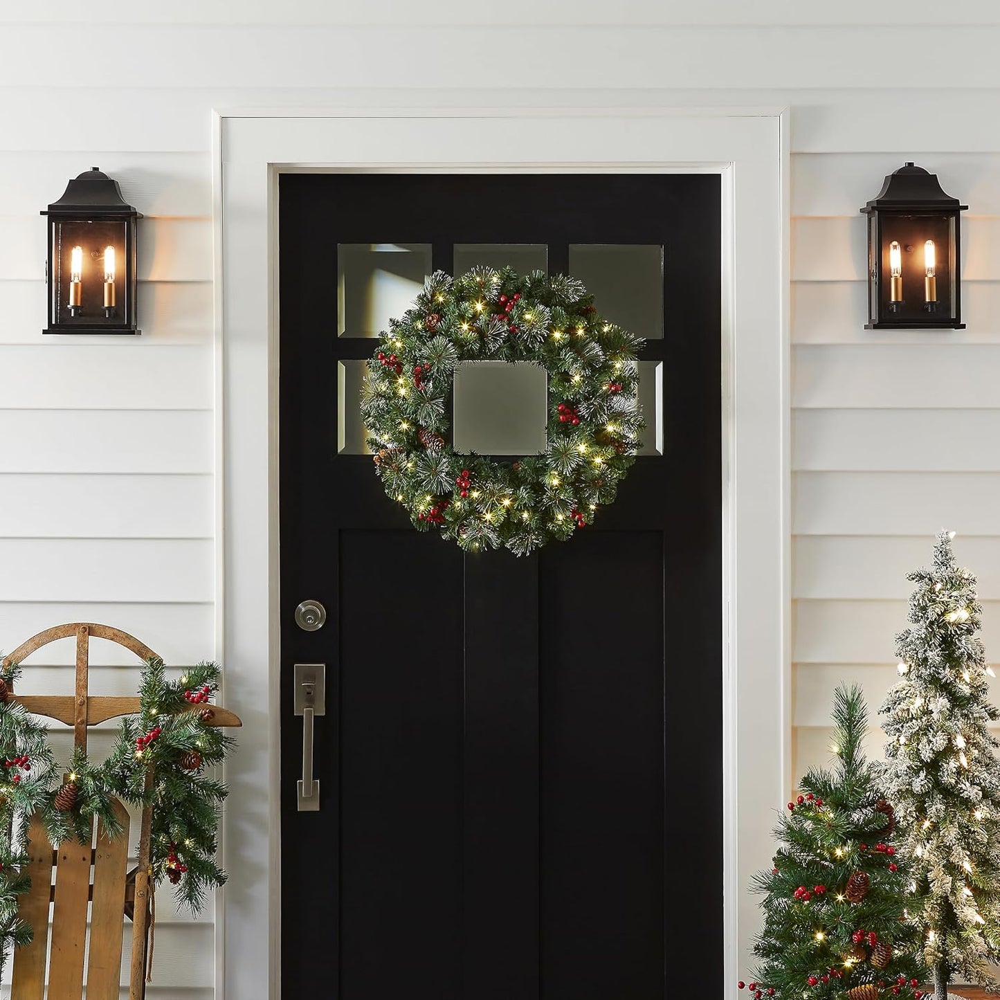 National Tree Company 24 in Pre-Lit Crestwood Spruce Artificial Christmas Wreath, Christmas Decoration with Glitter, Pinecones, Red Berries, 50 Clear LED Lights, 160 Tips, Timer, Green