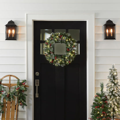 National Tree Company 24 in Pre-Lit Crestwood Spruce Artificial Christmas Wreath, Christmas Decoration with Glitter, Pinecones, Red Berries, 50 Clear LED Lights, 160 Tips, Timer, Green