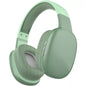 Mint green over-ear wireless headphones with textured ear cushions and volume controls