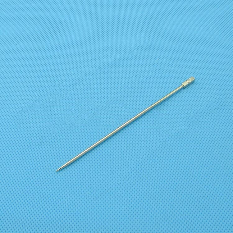 Metal sewing needle on blue textured background for crafting and tailoring projects