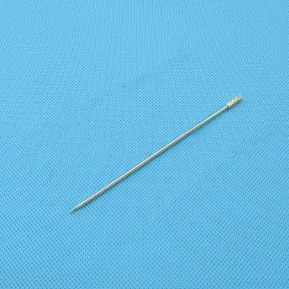 Metal sewing needle on blue textured background for crafting and tailoring projects