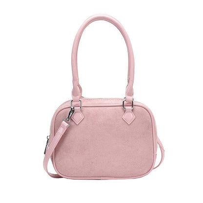 Pink suede handbag with top handle and detachable strap, stylish women's fashion accessory
