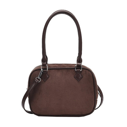 Brown suede handbag with top handle and detachable strap, stylish women's fashion accessory