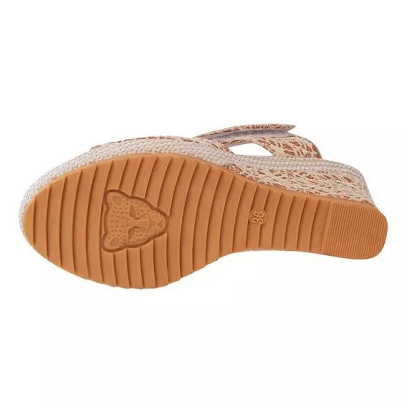 Women's espadrille wedge sandal with leopard print, tan sole, and size 36 marking
