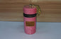 Pink glitter mini pouch with gold keychain, zip closure, and 'Vogue New Famous' label, ideal for small essentials.