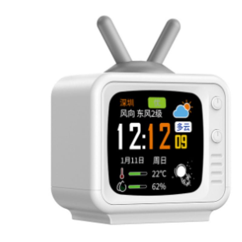 Retro TV-style digital alarm clock with weather display, temperature, and humidity monitor for home or office use.