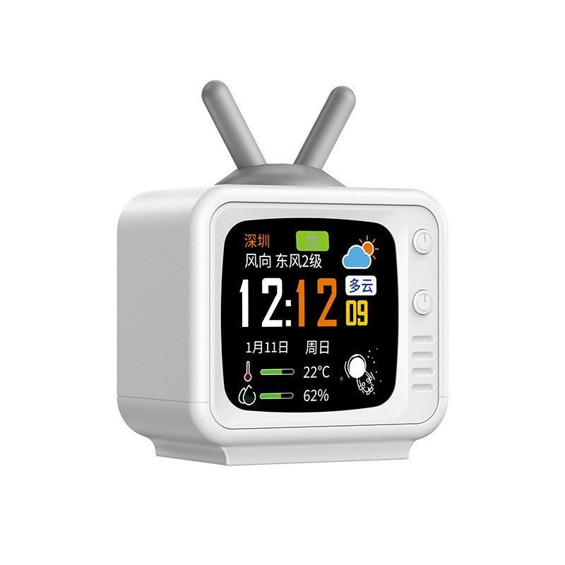 Retro TV-shaped smart clock displaying time, weather, temp, and humidity for home or office use