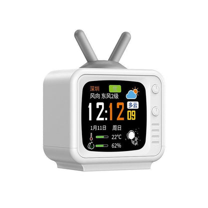 Retro TV-shaped smart clock displaying time, weather, temp, and humidity for home or office use