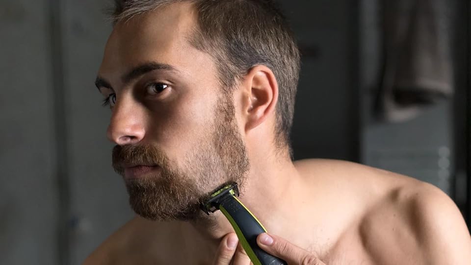 Philips OneBlade Hybrid Body and Face Stubble Trimmer with 4 x Lengths, 2 Extra Blade and Travel Pouch, - 7DAY'S