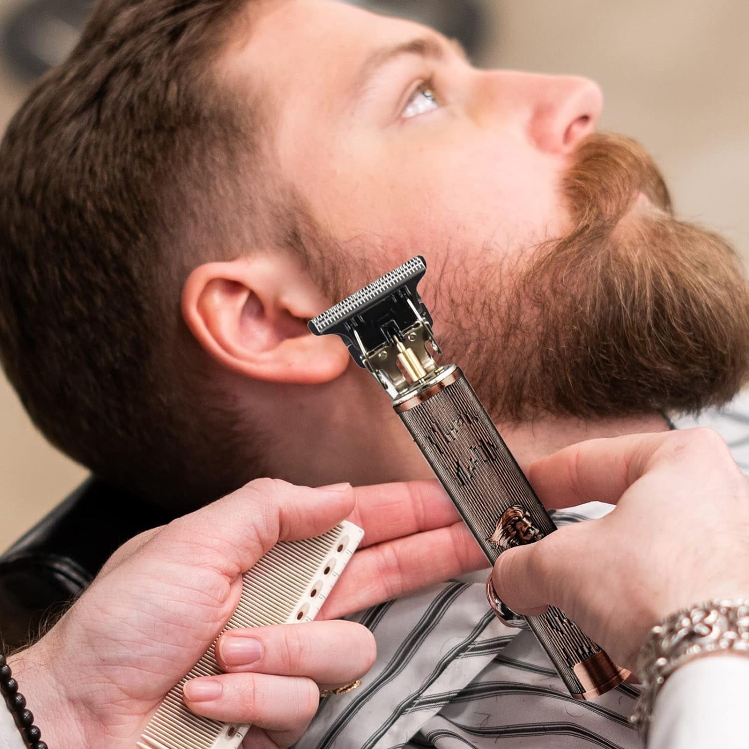 Man getting beard trim with electric shaver and comb, grooming tool for facial hair care